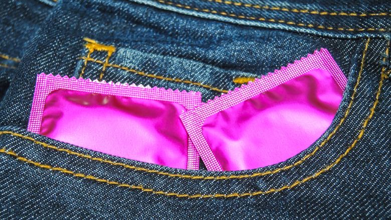 A pair of condoms in jeans pocket 