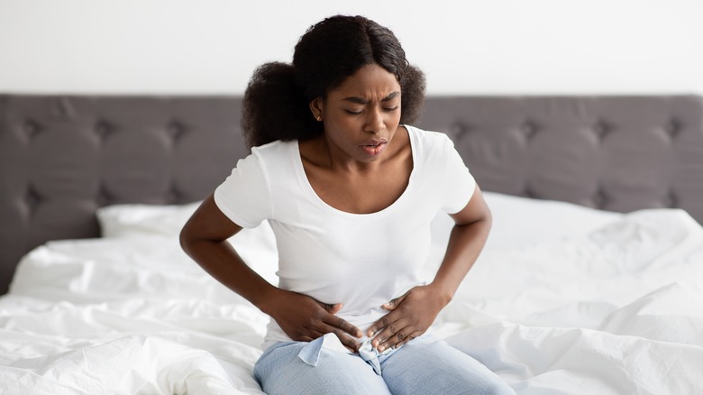 A woman has stomach pain