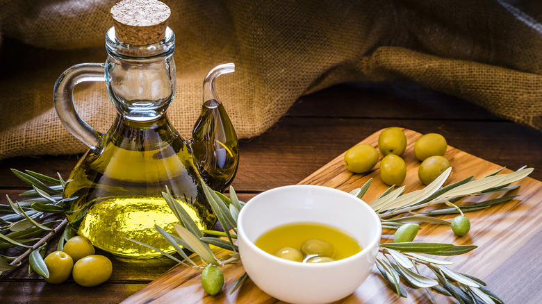 healthy bottle of olive oil and olives