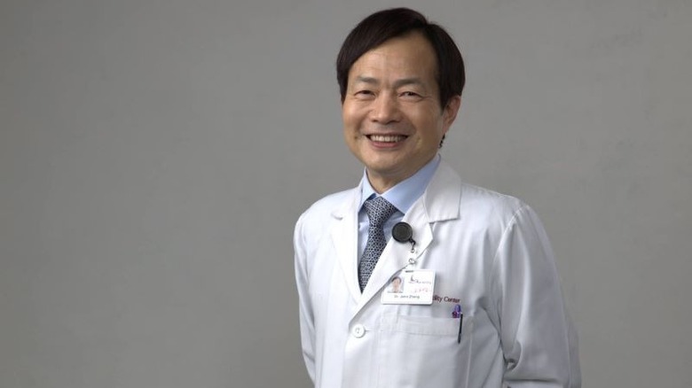 Dr. John Zhang smiling