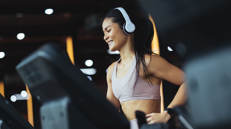 Woman smiling while on treadmill