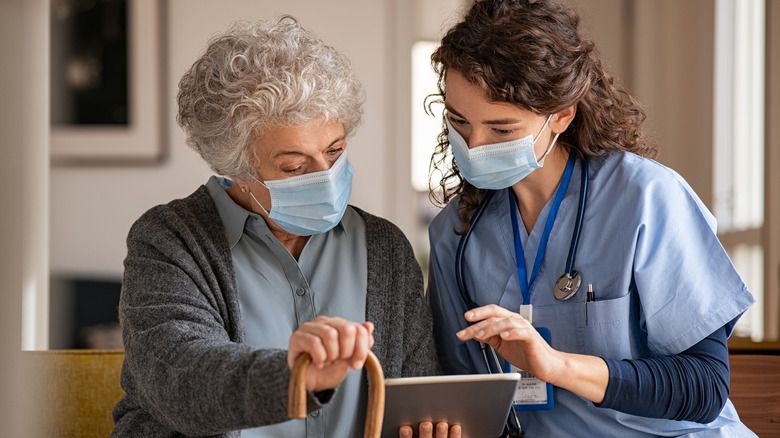 doctor and elderly woman