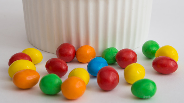 Bowl with artificially colored candy 