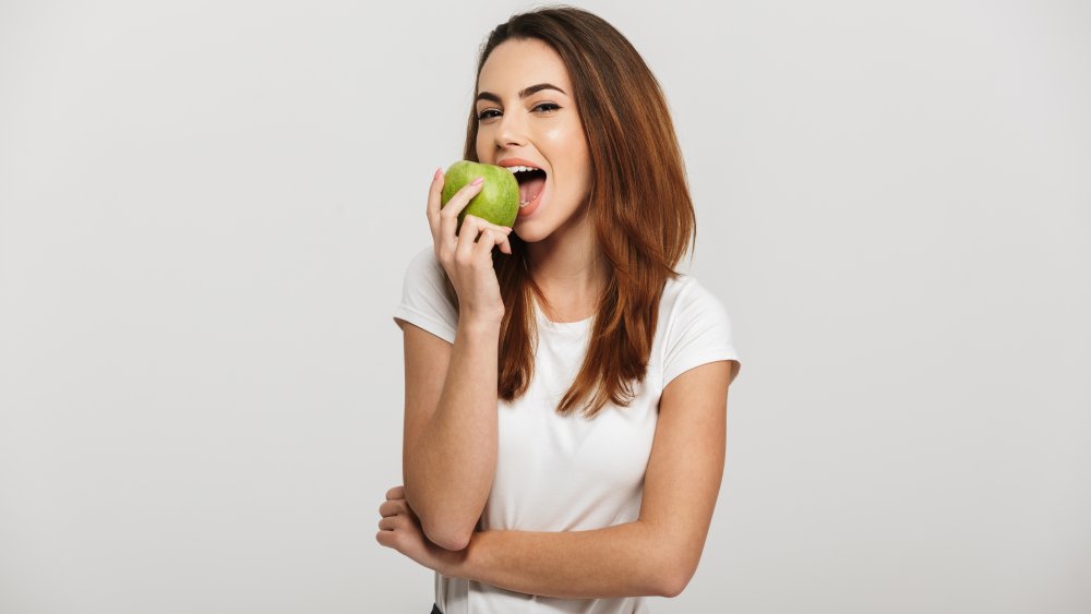 woman with apple