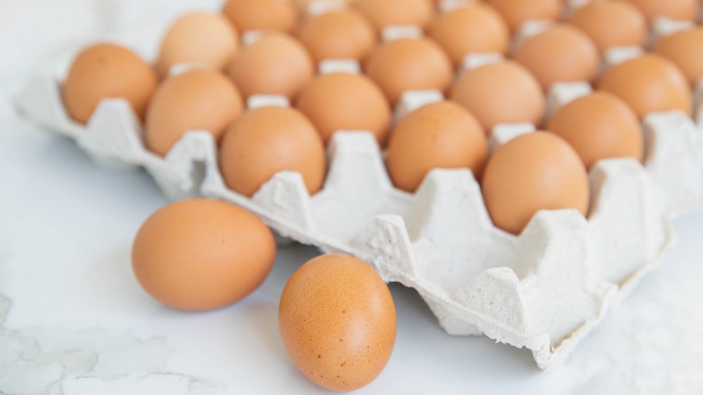 carton of brown eggs