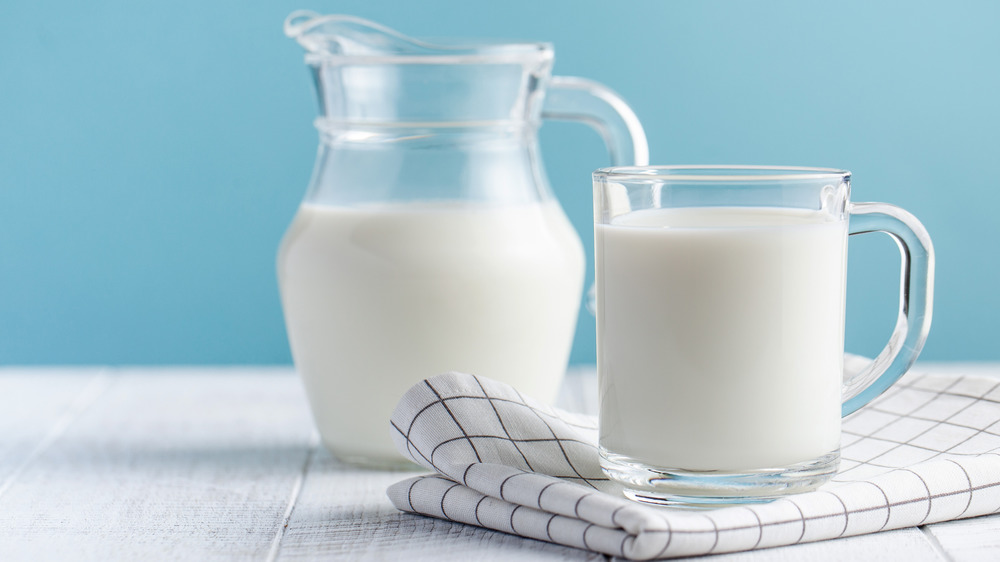 pitcher and glass of milk