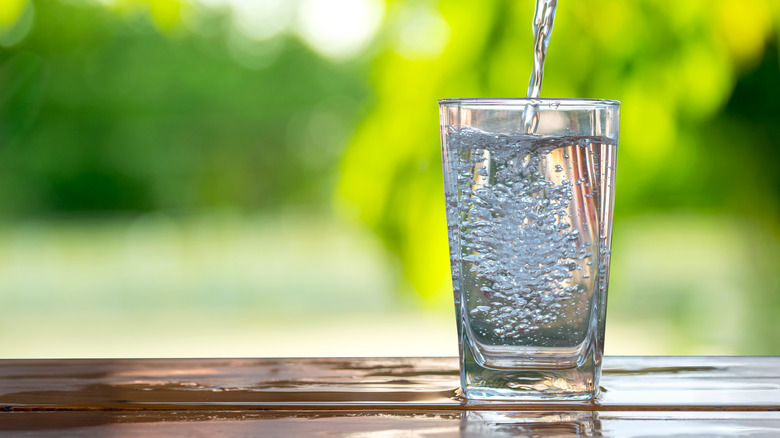 Water being poured into a glass