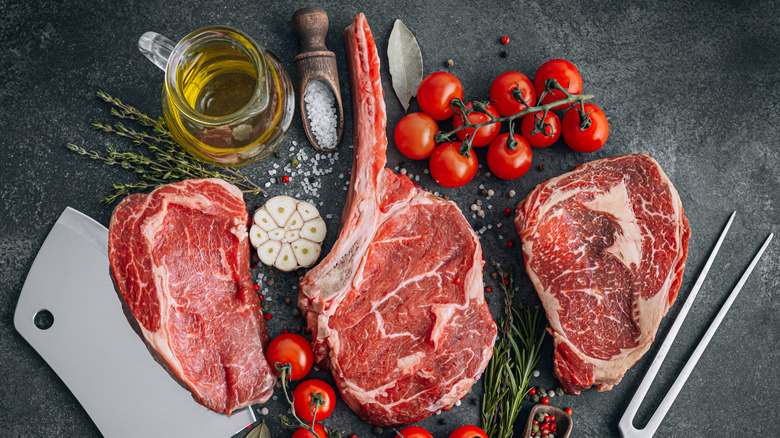 beef steaks with tomatoes and spices