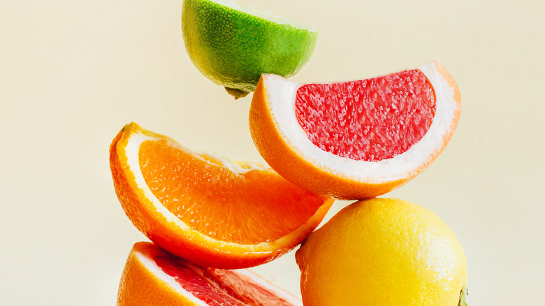 an assortment of citrus fruit