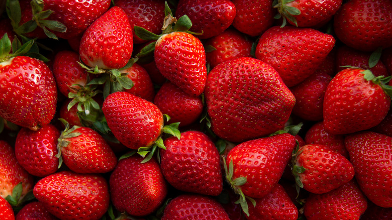 Red strawberries piled on top of one another