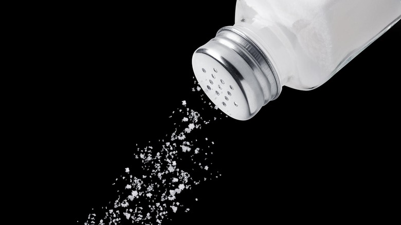alt shaker with salt falling out of it