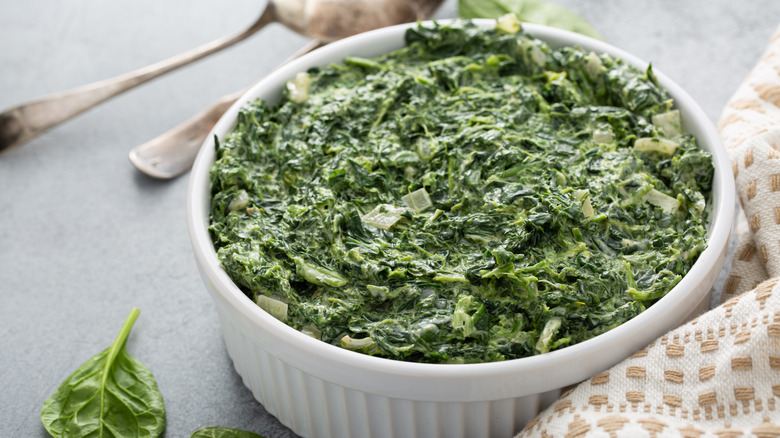 Creamed spinach with garlic in a bowl