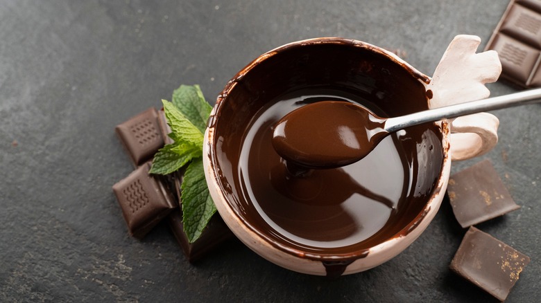 Overhead shot of chocolate candy and melted chocolate