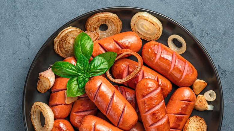 sausages and onions on plate