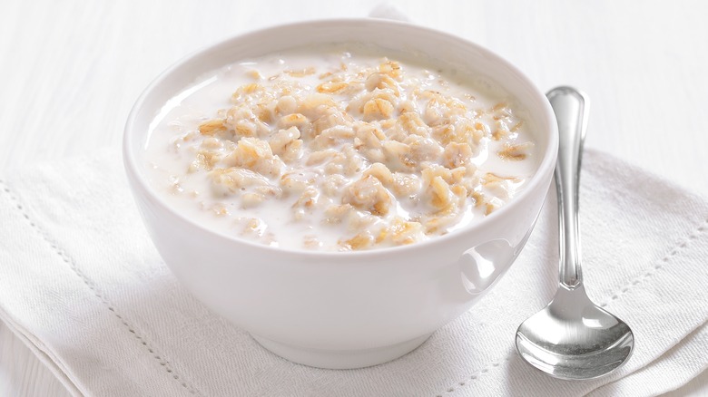 Oatmeal and milk in bowl