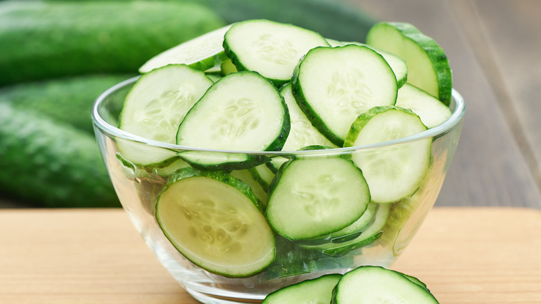 Sliced cucumber in a glass bowl