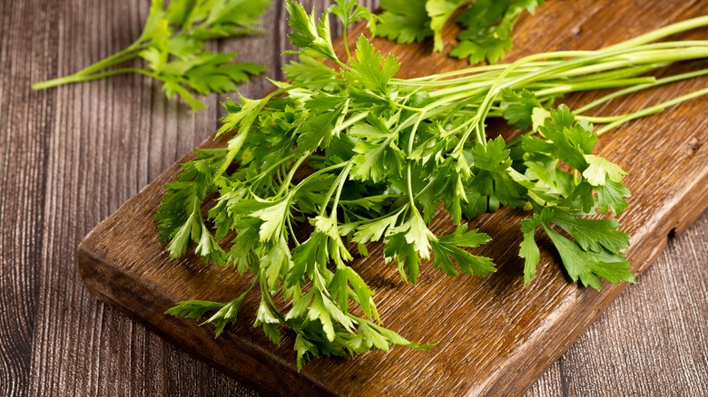 Parsley on a piece of wood