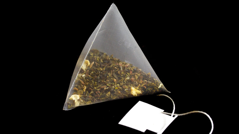 Triangular pyramid bag with green tea