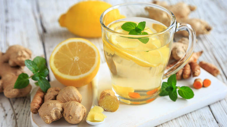 herbs and lemon steeped in hot water