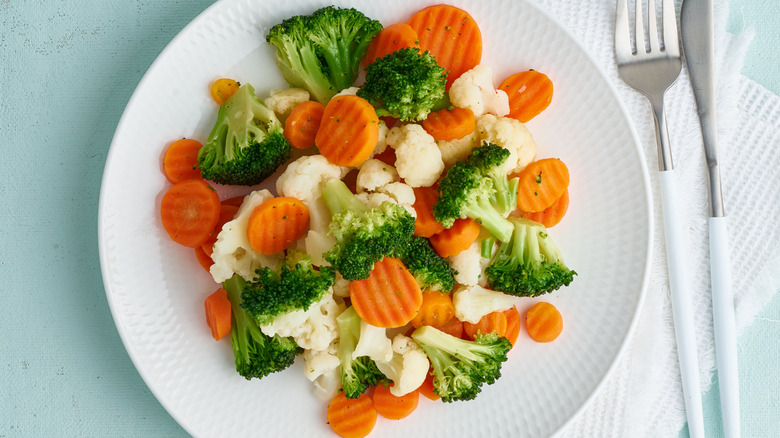 boiled broccoli and cauliflower on plate