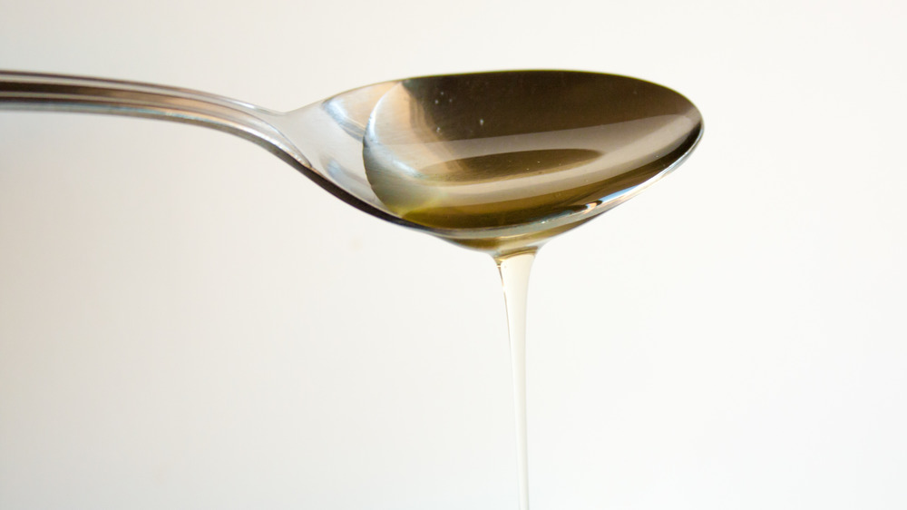 Agave nectar running off spoon