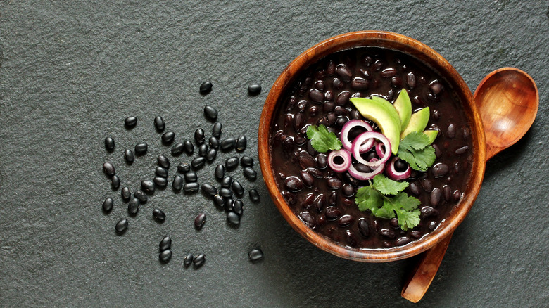 Black bean soup in a wooden bowl