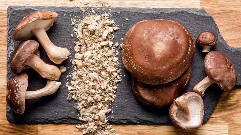 Shiitake mushrooms on cutting board
