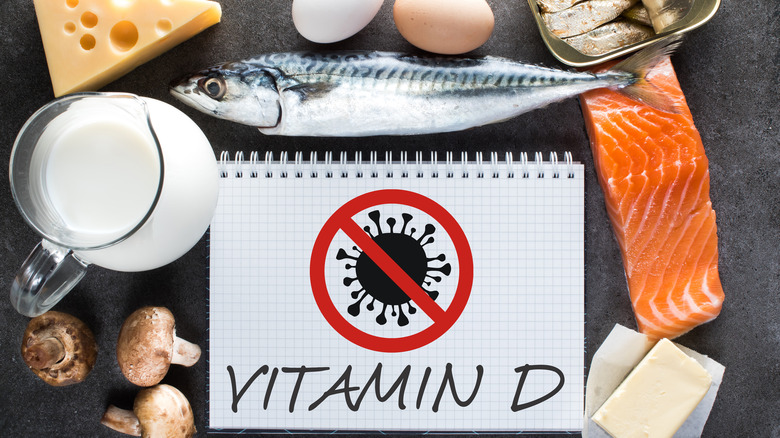 "VITAMIN D" sign surrounded by food
