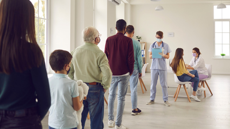 people in line for vaccine