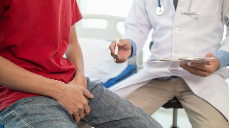 doctor talking with man about prostate cancer