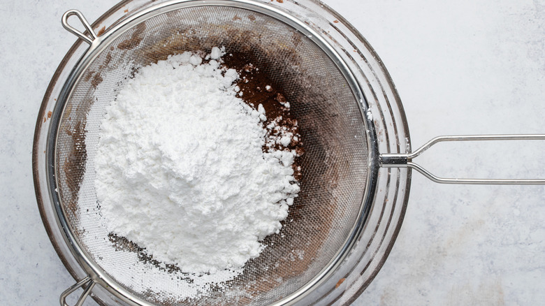 powdered sugar in sifter 