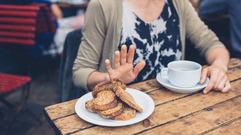 Woman saying no to gluten