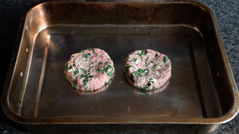 greek turkey burgers on pan