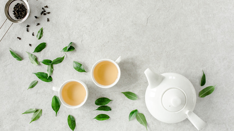 green tea and a white tea pot 