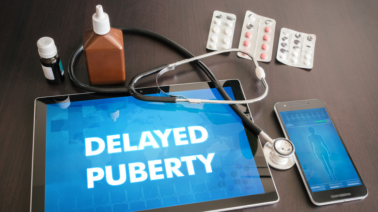 'Delayed Puberty" on tablet screen 
