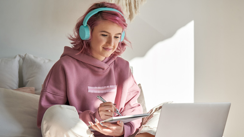 teenager listening to headphones