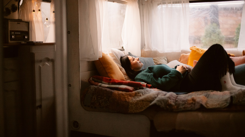 Relaxed woman looking out window