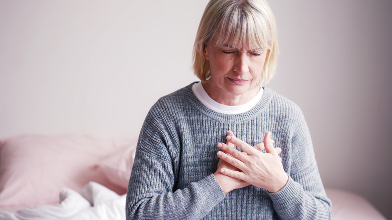 woman experiencing heart palpitations