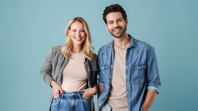 Two attractive people smiling