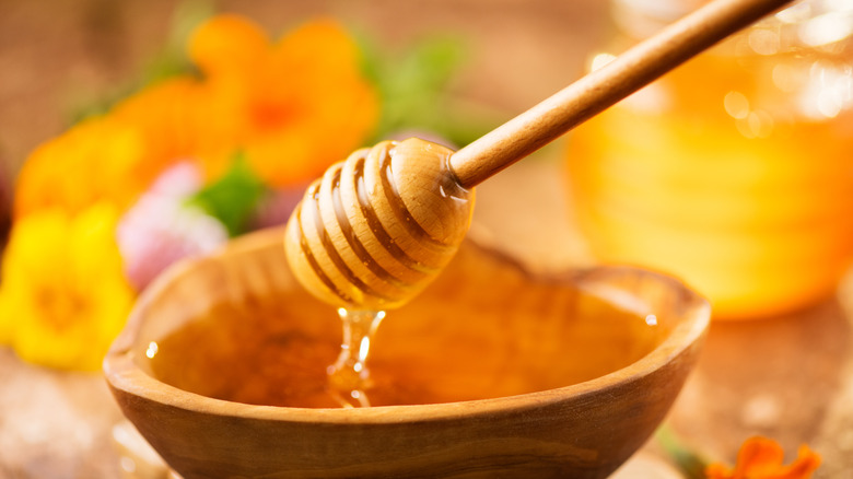 honey on wooden spool