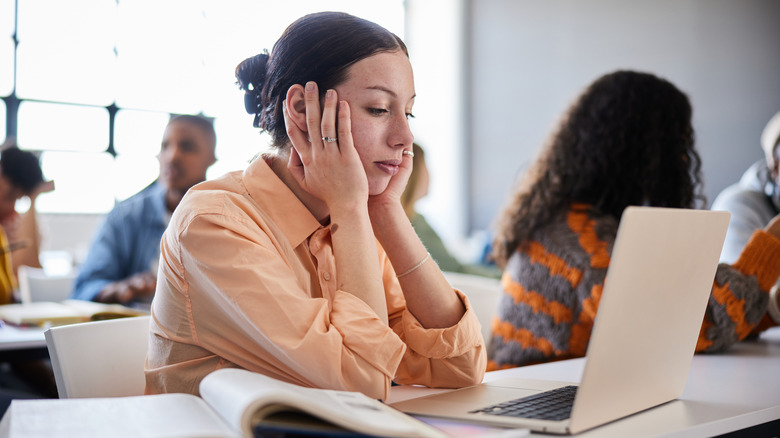 Student at school looking at laptop