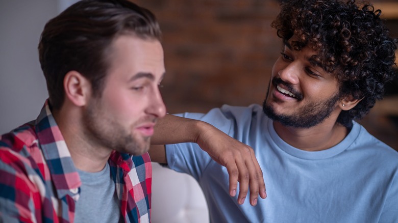 Two men talking providing support