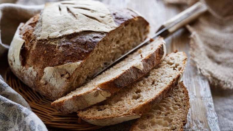 whole-wheat sourdough bread with knife