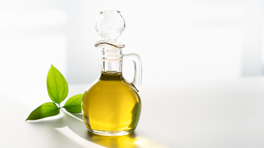 olive oil in glass bottle