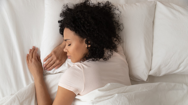 woman asleep in bed