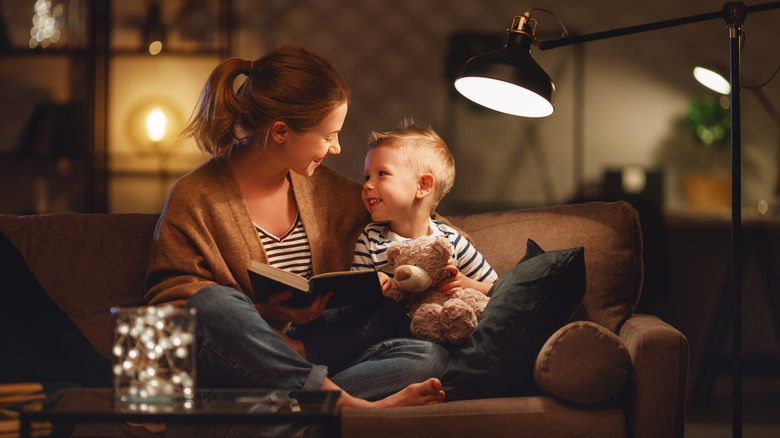 woman reading to child