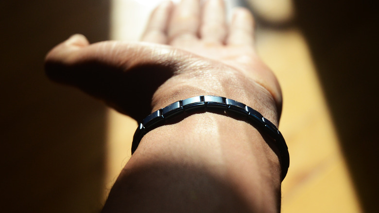 magnetic bracelet on man's wrist