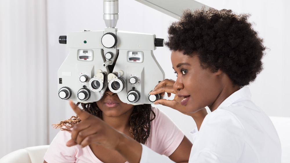 woman getting eye exam