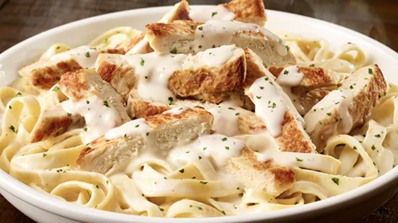 chicken alfredo on white dish