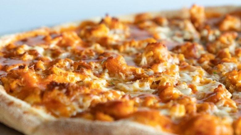 Buffalo chicken pizza close-up shot